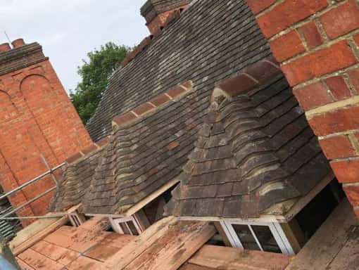 this is a photo of a roof being repaired in Hastings. Installation carried out by Hastings Roofing Services